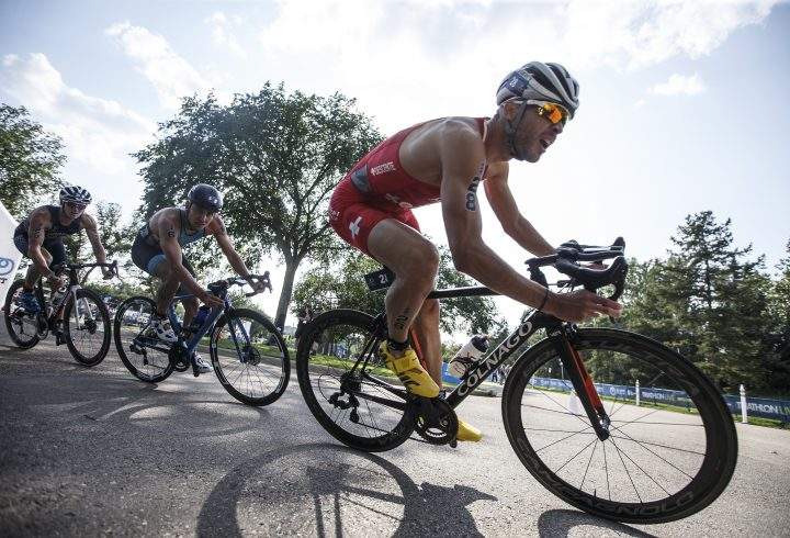 Sylvain Fridelance of Switzerland takes the corner during the Elite Men’s race at the ITU World Triathlon Series in Edmonton on Saturday, July 20, 2019.