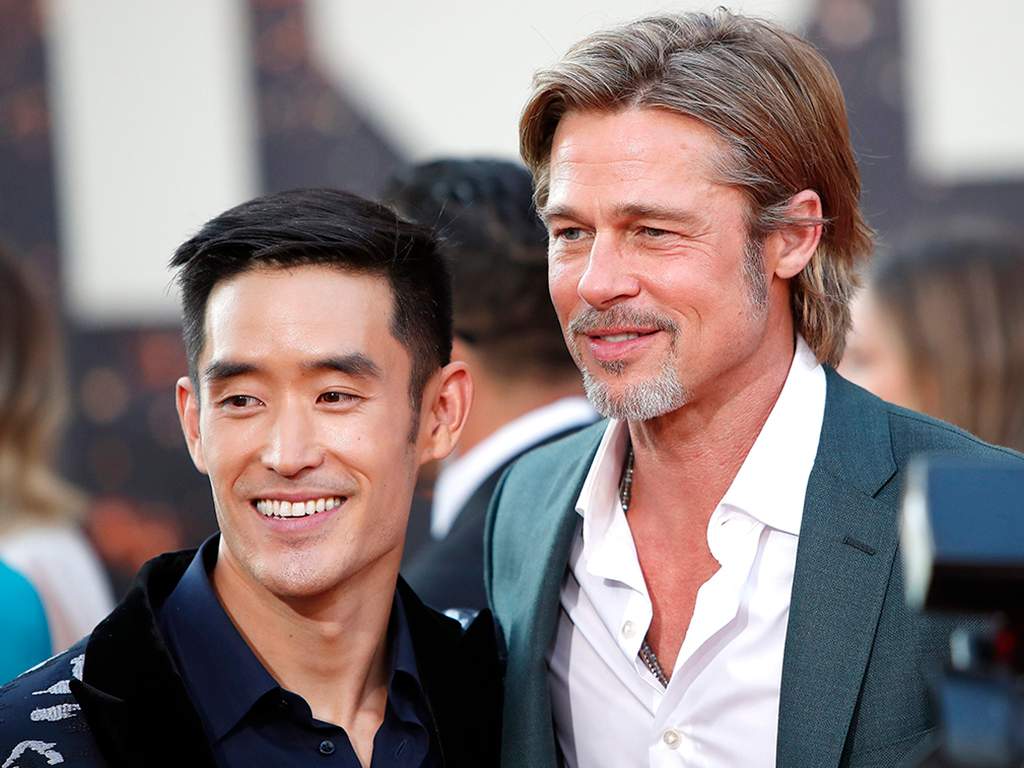 (L-R) Mike Moh and Brad Pitt arrive for the premiere of Once Upon a Time… in Hollywood at the TCL Chinese Theatre IMAX in Hollywood, Los Angeles, Calif., on July 22, 2019.