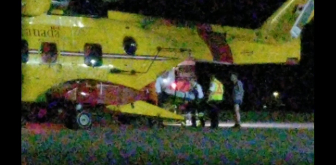Unidentified injured man being airlifted to hospital.  