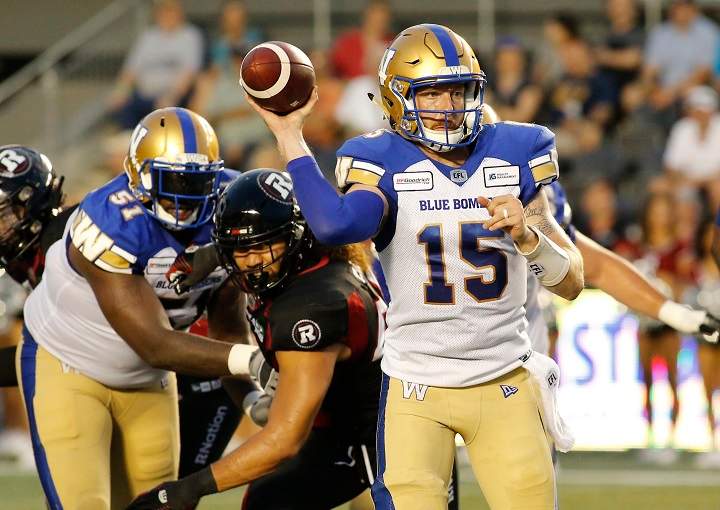 Winnipeg Blue Bombers quarterback Matt Nichols (15) throws the ball during second quarter CFL action against the Ottawa Redblacks in Ottawa on Friday, July 5, 2019.  
