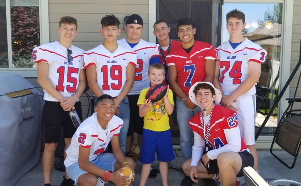 An Idaho high school football team surprised Christian Larsen at his birthday party.