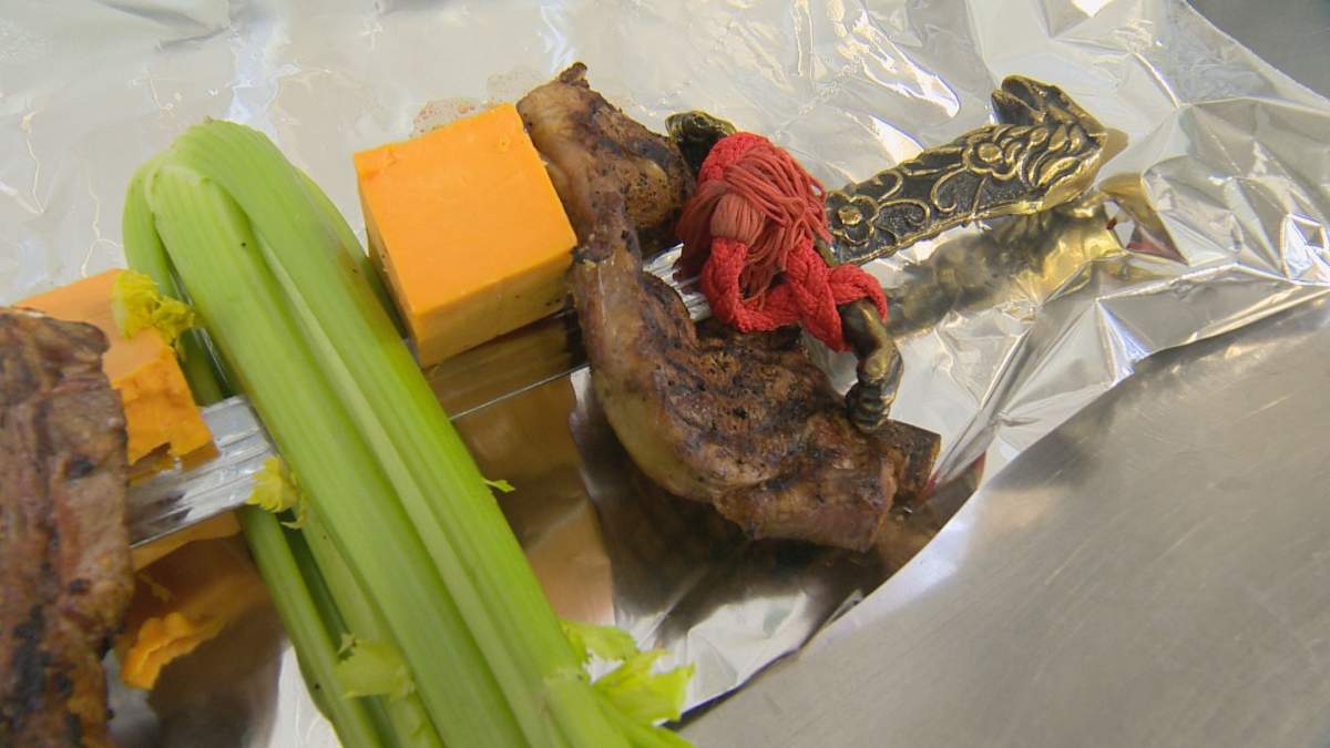 The Caesar’s garnish matched up to its drink with two blocks of cheese, a celery stalk, and two pieces of steak.