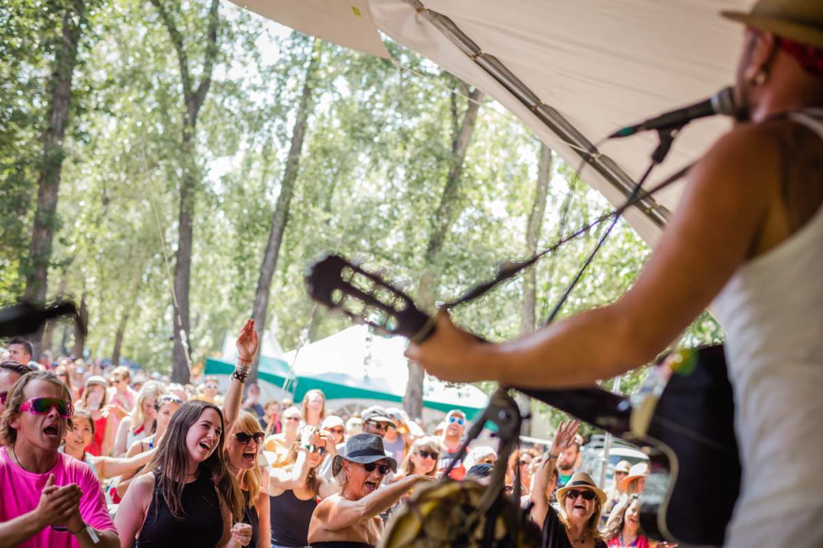 Festival-goers enjoy a performance at the 2018 Calgary Folk Music Festival.