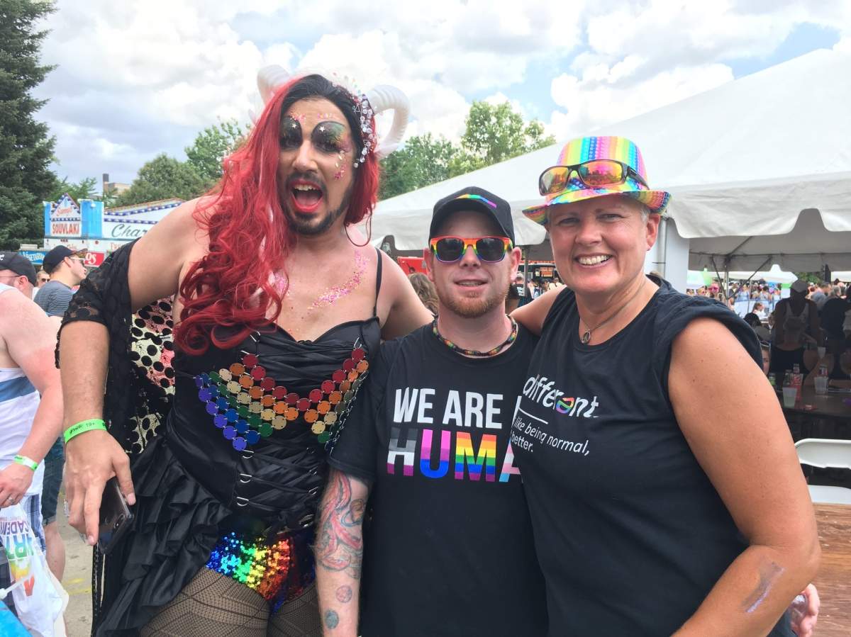 Chastity Cage (left), Cage’s husband (middle), and one of Cage’s mothers (right)