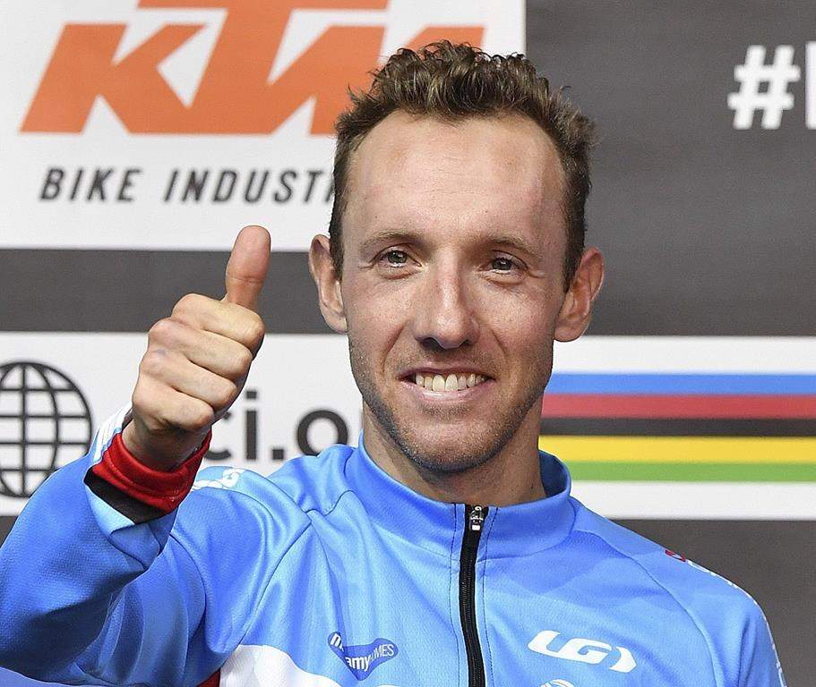Third-place winner Michael Woods from Canada gives a thumbs up after the men's road race at the Road Cycling World Championships in Innsbruck, Austria on Sept.30, 2018. Woods, in his first Tour, is aiming for a stage win. The 106th edition of the Tour opens Saturday in Brussels.