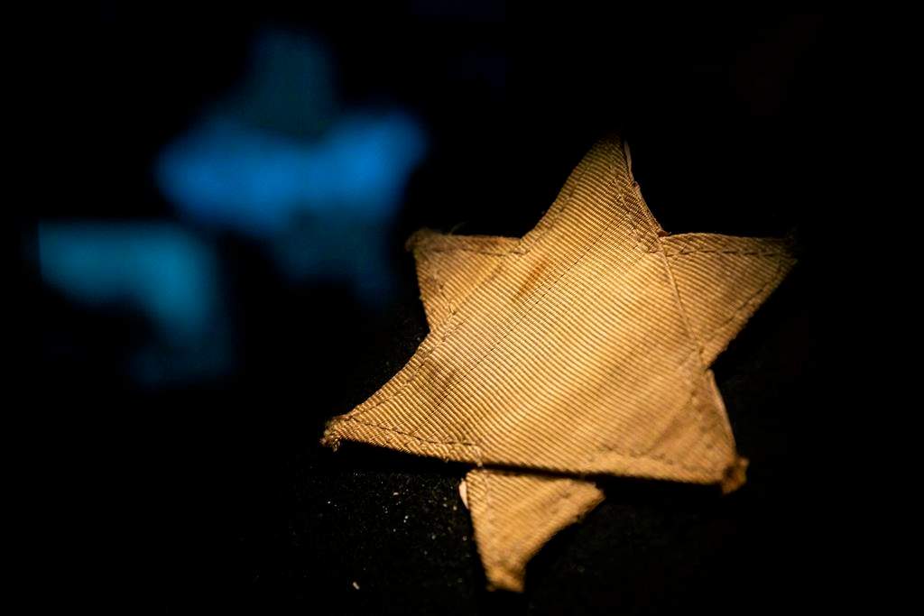 A yellow star to represent the Star of David, made of fabric on display in the Holocaust Memorial Center in Budapest, Hungary, Thursday, Jan. 24, 2019. CANADIAN PRESS/AP, Balazs Mohai/MTI.