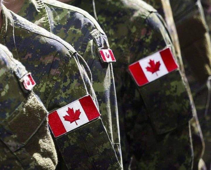 Members of the Canadian Armed Forces march during the Calgary Stampede parade in Calgary, Friday, July 8, 2016. The federal government is paying $900 million to settle multiple class-action lawsuits lodged on behalf of survivors of sexual harassment, gender discrimination and sexual assault in the military.