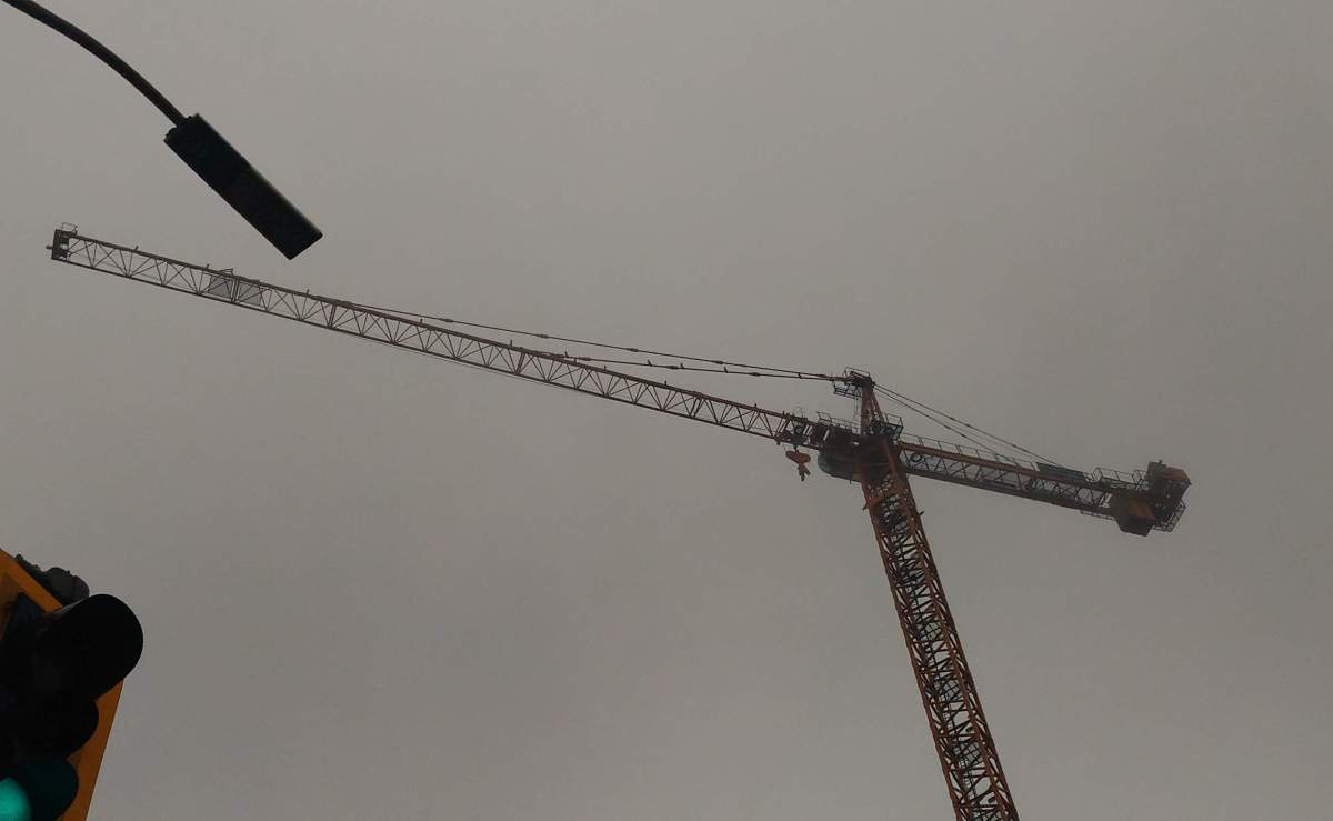 Hamilton police say a man climbed a downtown construction crane on Tuesday.