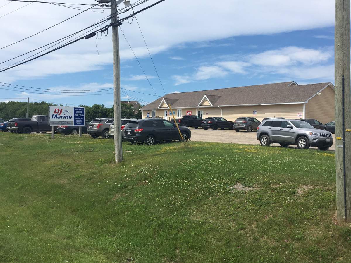RCMP are on scene at a business in in Pointe-Sapin, N.B., where two bodies were found after a shooting on July 25, 2019. 