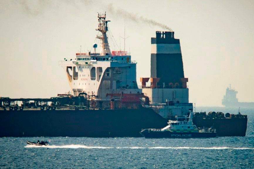 A view of the Grace 1 super tanker i near a Royal Marine patrol vessel in the British territory of Gibraltar, Thursday, July 4, 2019.