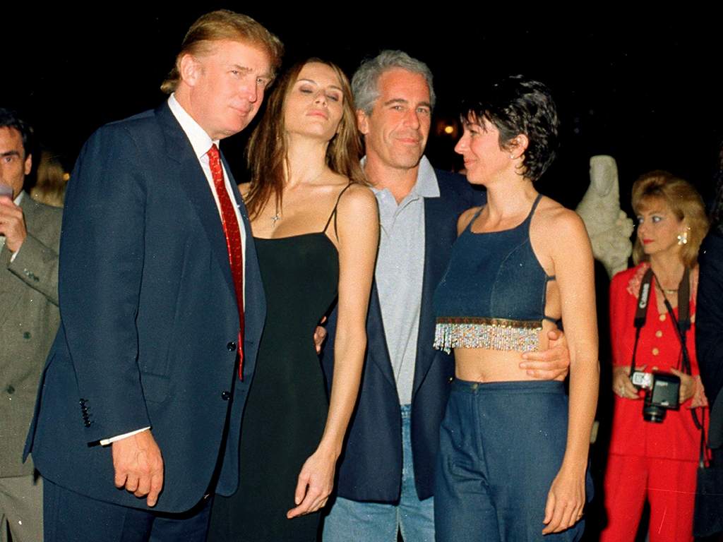 Donald Trump and his then-girlfriend Melania Trump, next to, financier Jeffrey Epstein, and British socialite Ghislaine Maxwell at the Mar-a-Lago club, Palm Beach, Florida, February 12, 2000.