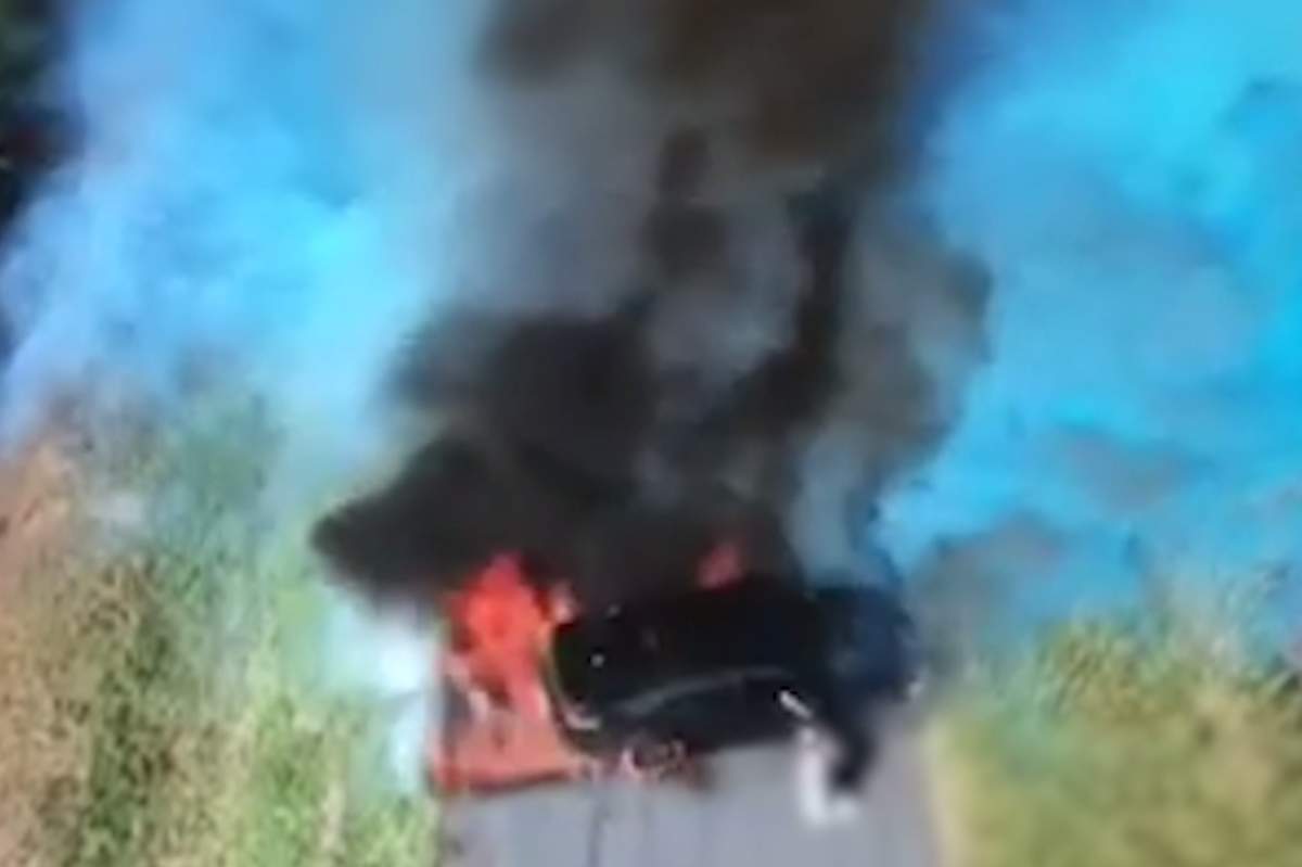 The wheels on a black sedan catch fire in this failed gender-reveal “burnout” in Queensland, Australia, on Apr. 18, 2018.