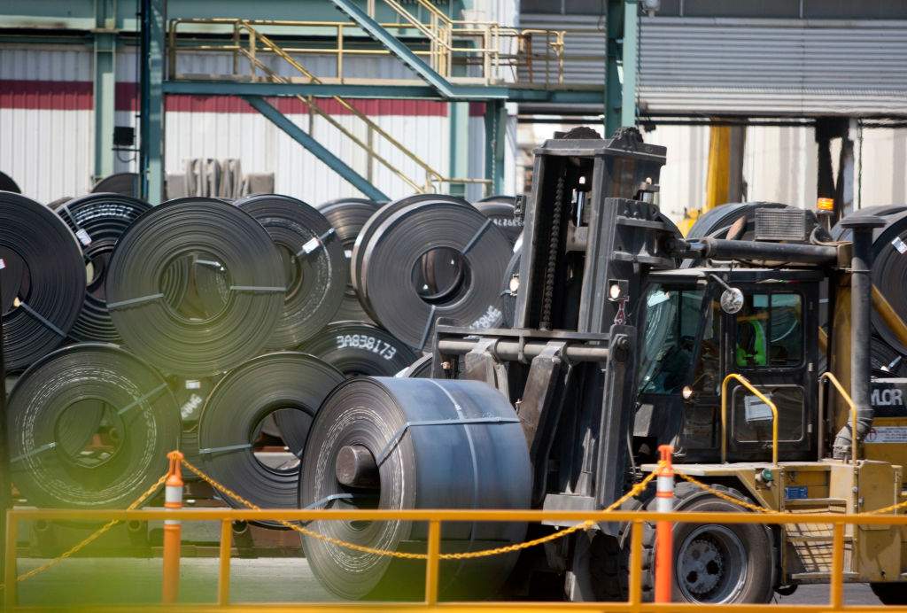 A worker uses a forklift to load a steel coil, at a plant in Monterrey, Mexico on August 27, 2018.