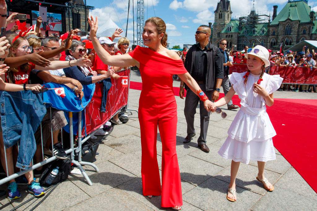 Sophie Grégoire Trudeau and daughter Ella-Grace greet revelers at Canada Day celebrations at Parliament Hill on July 01, 2019 in Ottawa, Canada.