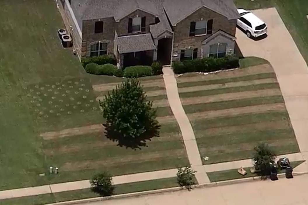 An American flag is shown cut into Cameron James’ lawn in Haslet, Texas.