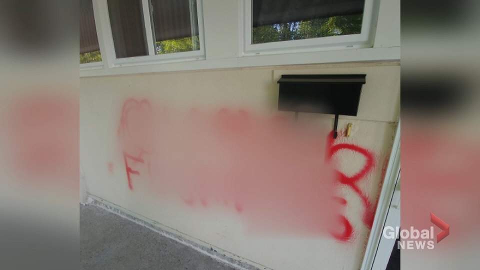 Homophobic graffiti was spray-painted outside a gay couple’s apartment in Dartmouth