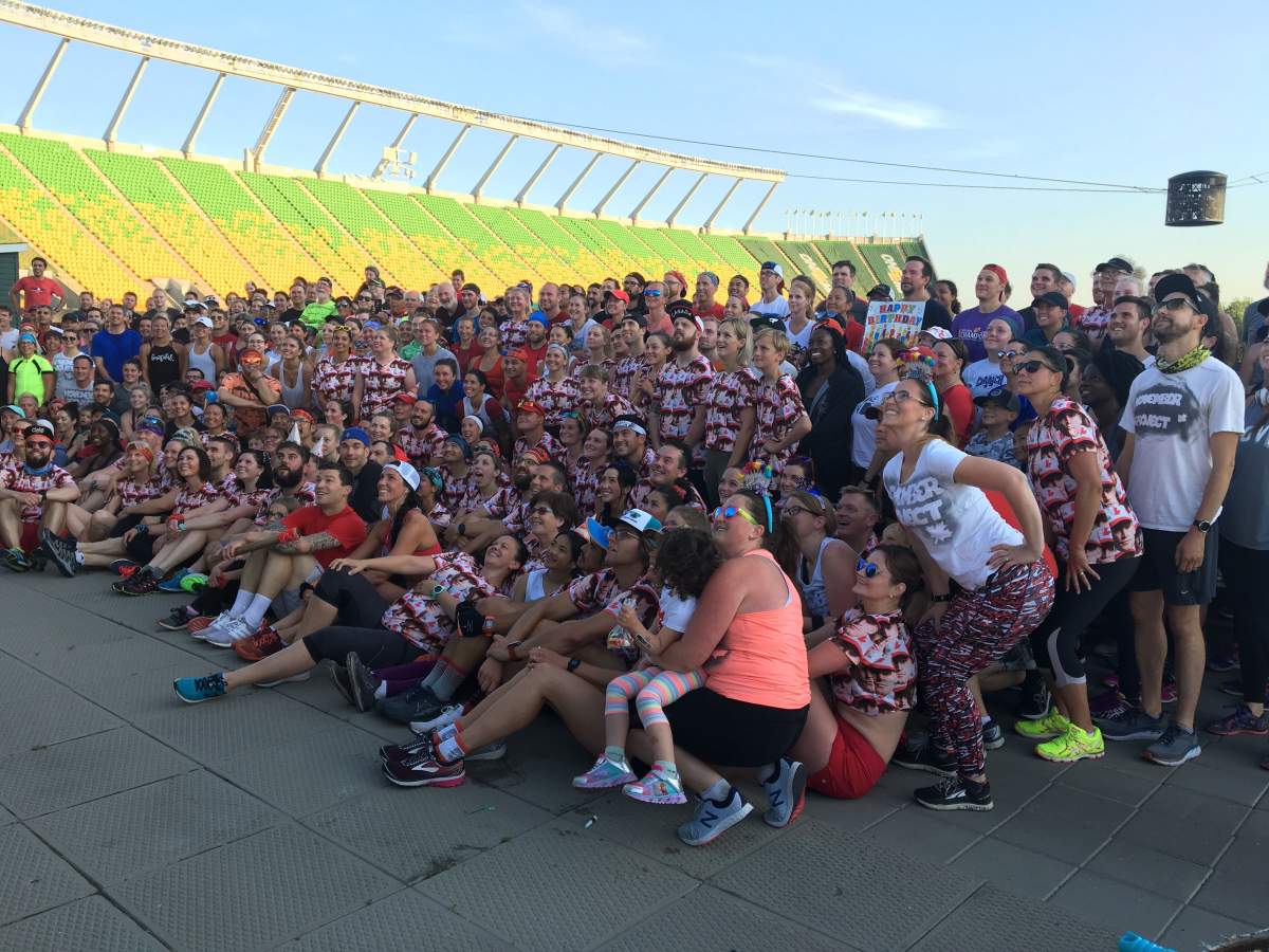 November Project participants at Commonwealth Stadium gathered for a photo to celebrate six years of free workouts on the same day Andrew Ference stepped down as co-leader of the free fitness event. Wednesday, July 17, 2019.