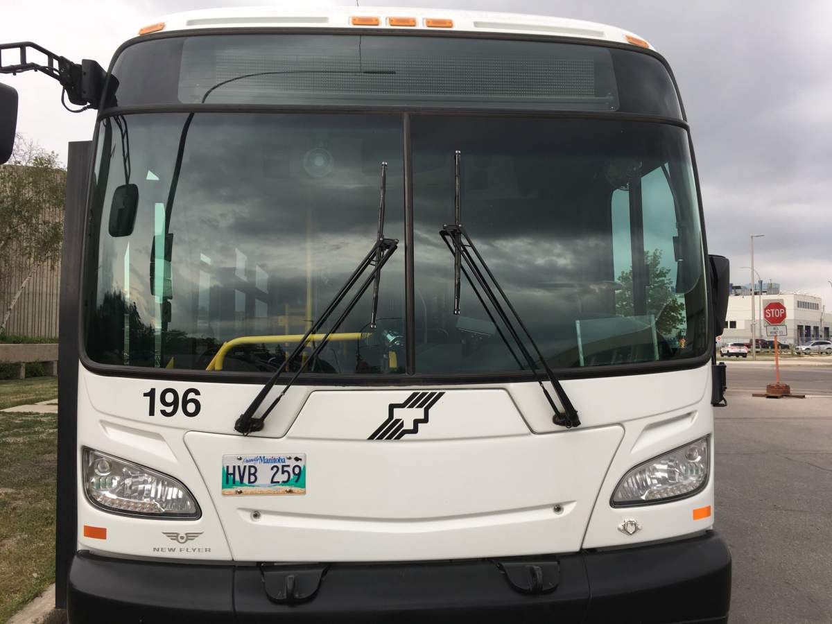 FILE - A Winnipeg Transit bus. Police say a man was arrested Saturday after smashing bus windows with a machete.