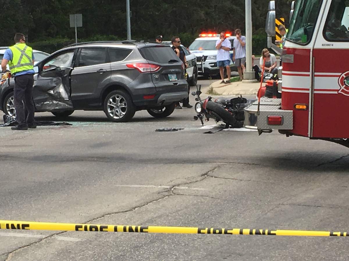 The scene of a motorcycle and vehicle collision at St. Vital Road and Dunkirk Avenue on Sunday afternoon.