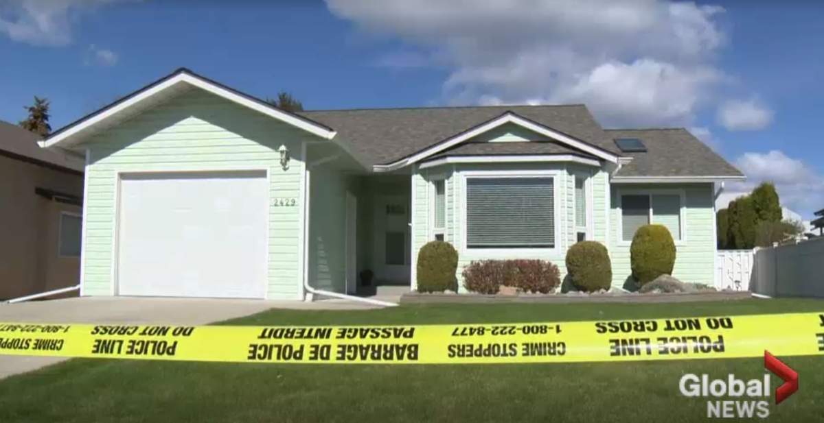 The home of Kathy Brittain, the ex-wife of accused quadruple murderer John Brittain, behind police tape in April. 