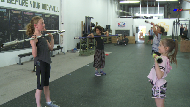 Several young girls are building their confidence and self-esteem through classes at a Pickering crossfit gym.