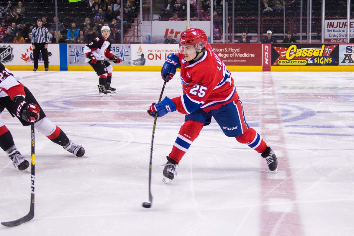 Mike Ladyman in action as a member of the Spokane Chiefs. Photo Credit- Larry Brunt .