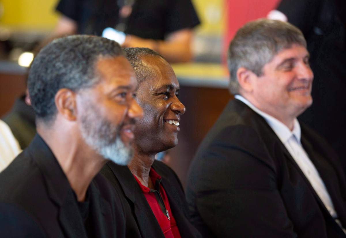 Former Winnipeg Blue Bomber defensive back, Less Browne, middle, smiles with fellow inductees, Damon Allen, left, and Dan Ferrone, right, during the official relaunch of the Canadian Football Hall of Fame (CFHOF) and Museum in 2018. Browne will be inducted into the Bomber's Hall of Fame this fall.