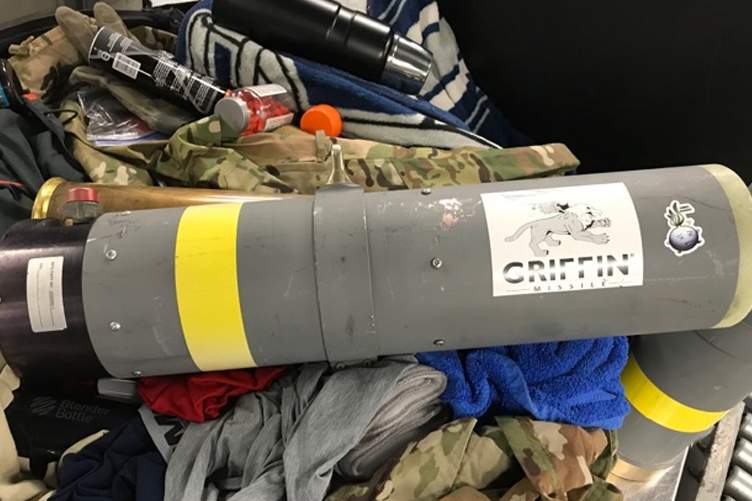 A Griffin missile launcher is shown in a passenger’s luggage at an airport in Baltimore on July 29, 2019.