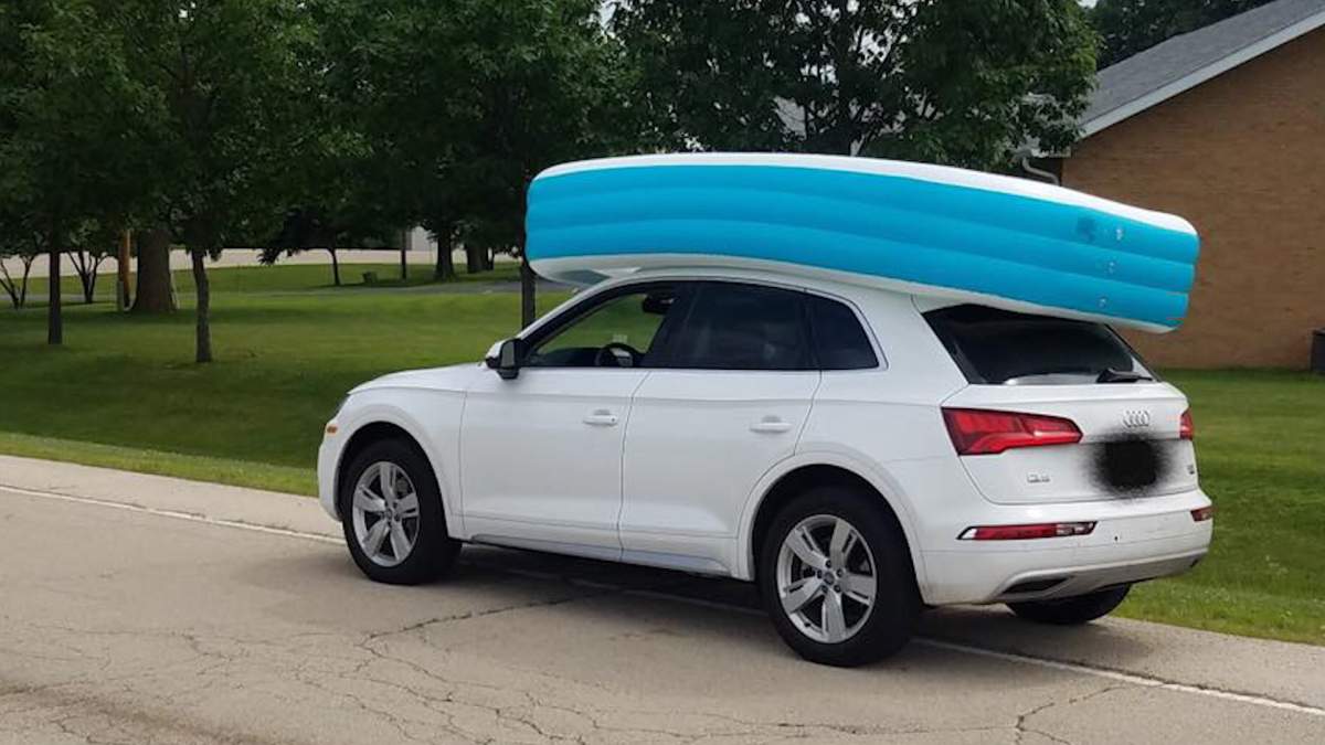 A photo provided by the Dixon Police Department shows a woman's car with an inflatable pool on top.