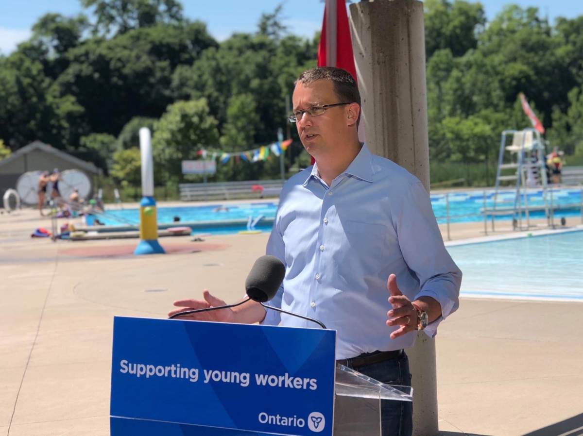 Ontario Labour Minister Monte McNaughton addresses reporters at the Thames Pool on Ridout Street in London, Ont.