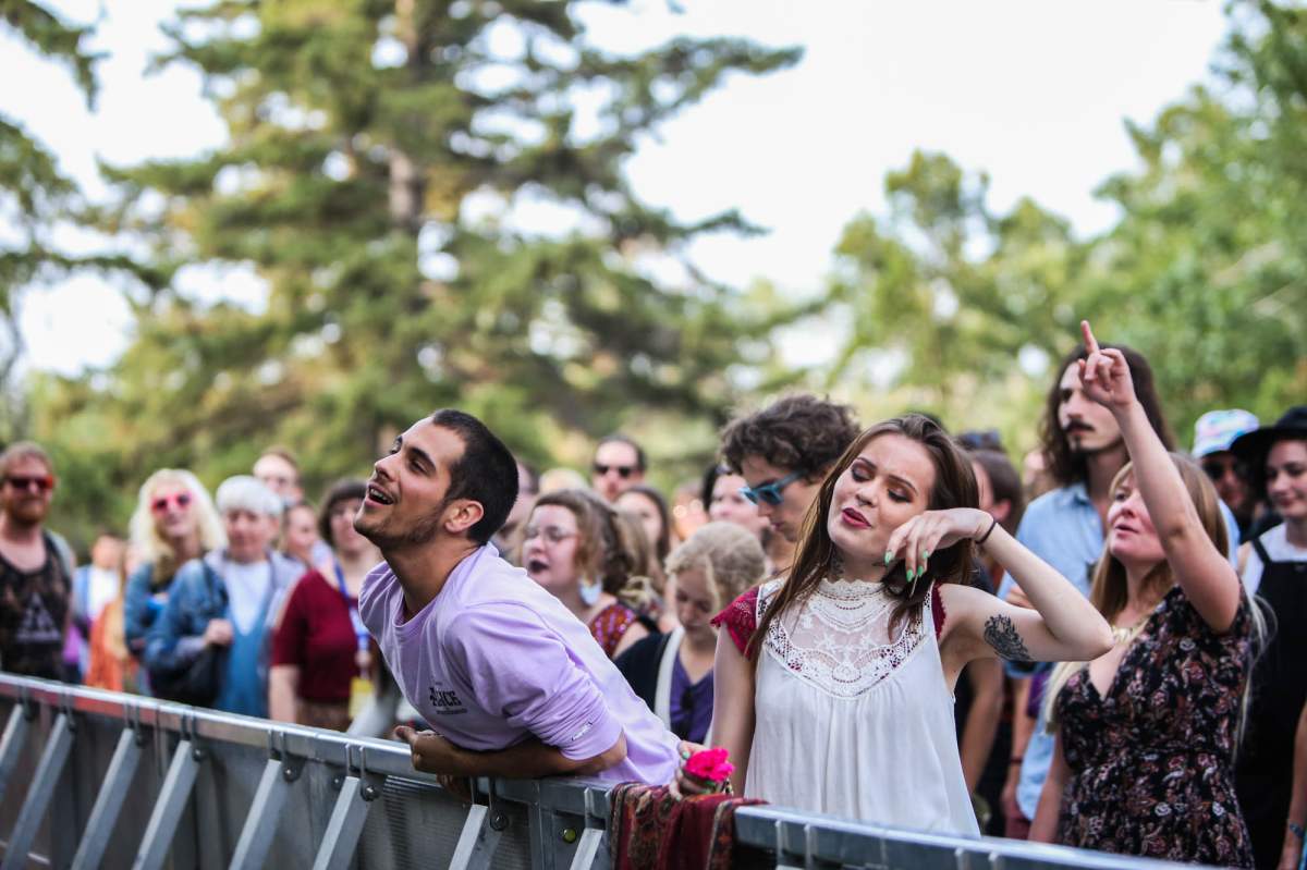 Fans dance during a show at the 2018 Calgary Folk Music Festival.