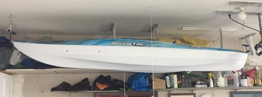 The kayak is described as baby blue colour with a white hull.