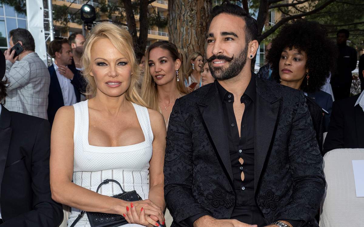 (L-R) Pamela Anderson and Adil Rami attend Amber Lounge 2019 Fashion Show on May 24, 2019 in Monte-Carlo, Monaco.