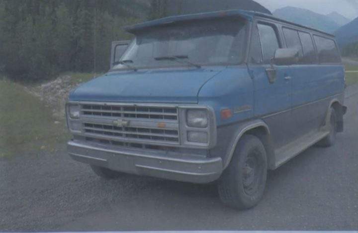 A blue 1986 Chevrolet van bearing Alberta licence plates was located at the scene.