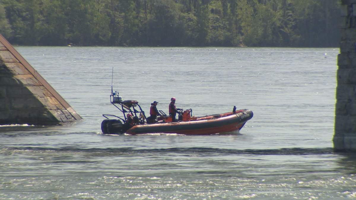 The small boat capsized on Monday in the St. Lawrence River.