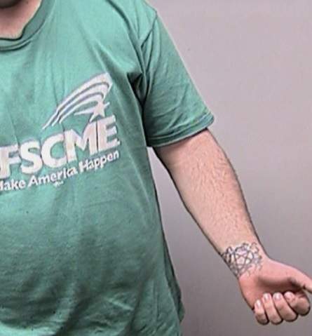Whisenand has a tattoo of a pentagram on his lower left wrist.