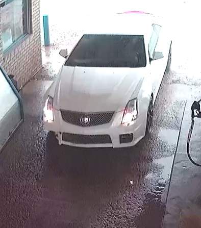 2011 White Cadillac CTS with front passenger bumper damage