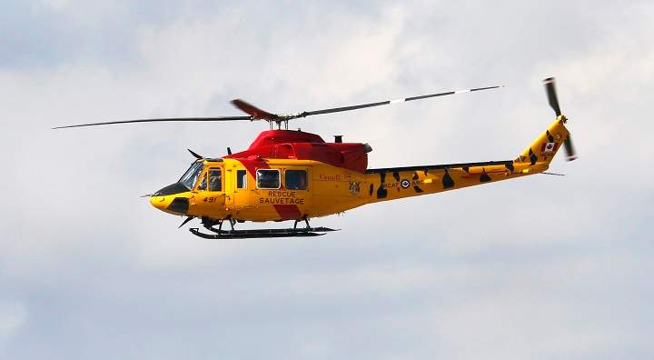 The RCAF crew of CH-146 Griffon helicopter airlifted six survivors following a plane crash on Upper Raft Lake. 