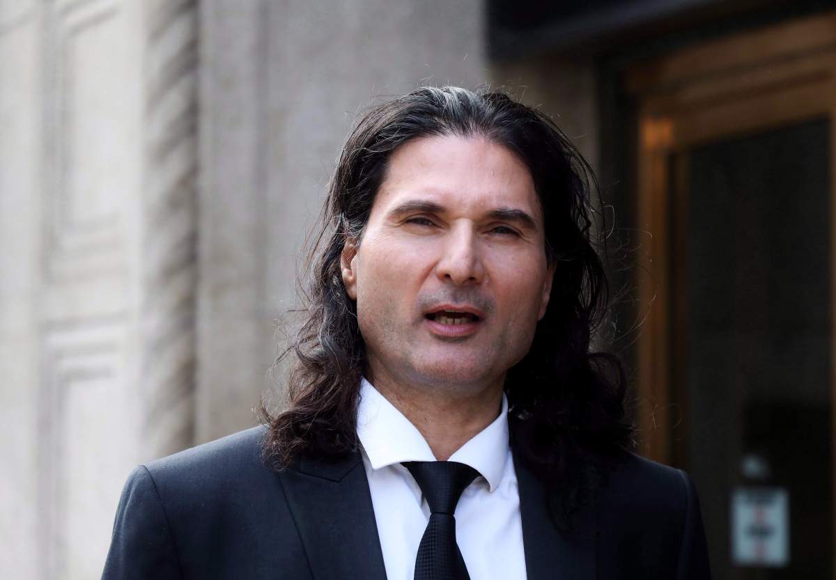 James Sears, editor in chief of "Your Ward News," is seen outside Ontario court in Toronto on Wednesday, Nov. 28, 2018. 