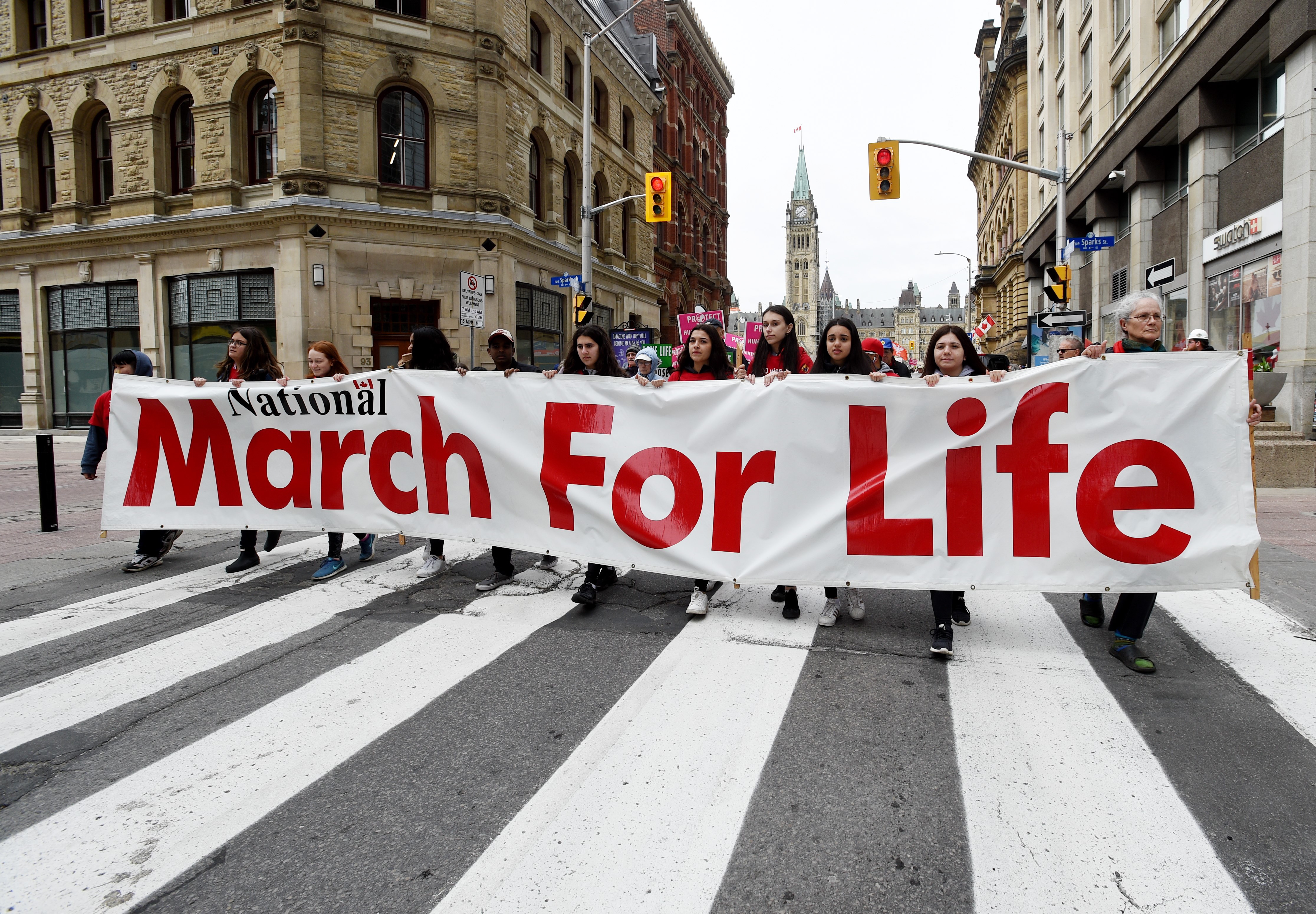 People take part in the March For Life rally on Parliament Hill in Ottawa.