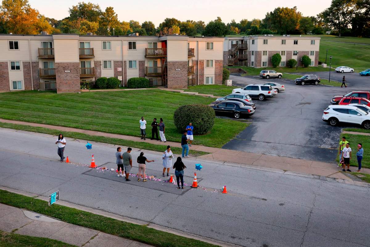 A memorial, where Michael Brown was shot and killed by Ferguson Police officer Darren Wilson, is rebuilt on Canfield Drive in Ferguson, Mo., on Wednesday, Aug. 7, 2019.