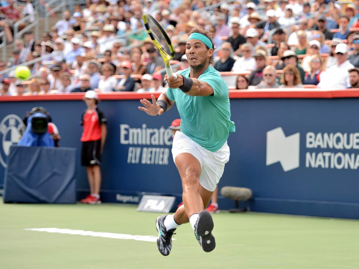 Spain's Rafael Nadal hits a shot against Russia's Daniil Medvedev during the final of the Rogers Cup tennis tournament in Montreal, Sunday, August 11, 2019. 