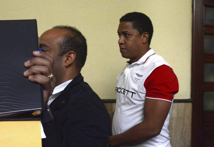 Former MLB pitcher Octavio Dotel is transferred to a police station after his arrest for alleged links to a drug-trafficking and money-laundering ring in Santo Domingo, Dominican Republic, Tuesday, Aug. 20, 2019. There was no immediate comment from Dotel, who set a record for playing on more MLB teams than any other player. 