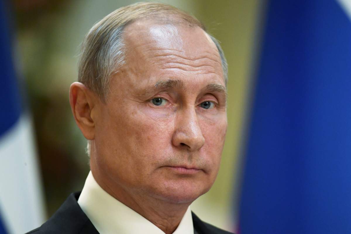 Russian President Vladimir Putin is shown during a press conference in the Finland Presidential Palace in Helsinki on Aug. 21, 2019. 