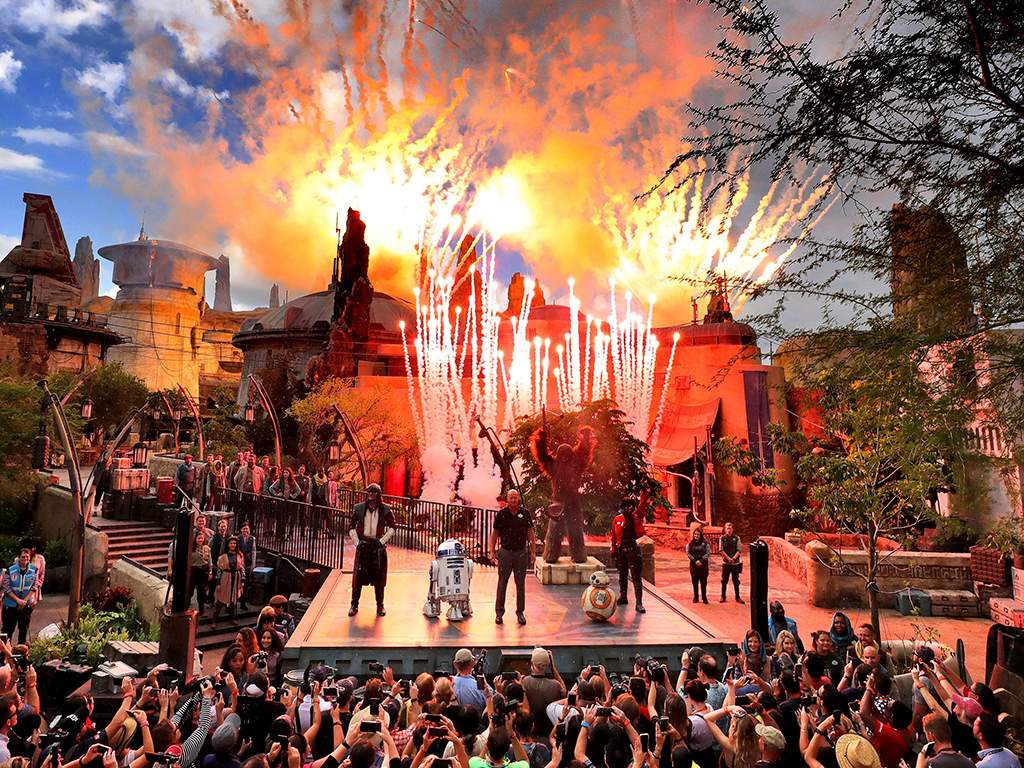 Fireworks blast during the dedication ceremony with invited guests at the entrance of the Star Wars: Galaxy’s Edge attraction at Disney’s Hollywood Studios in Lake Buena Vista, Fla., Wednesday, Aug. 28, 2019.