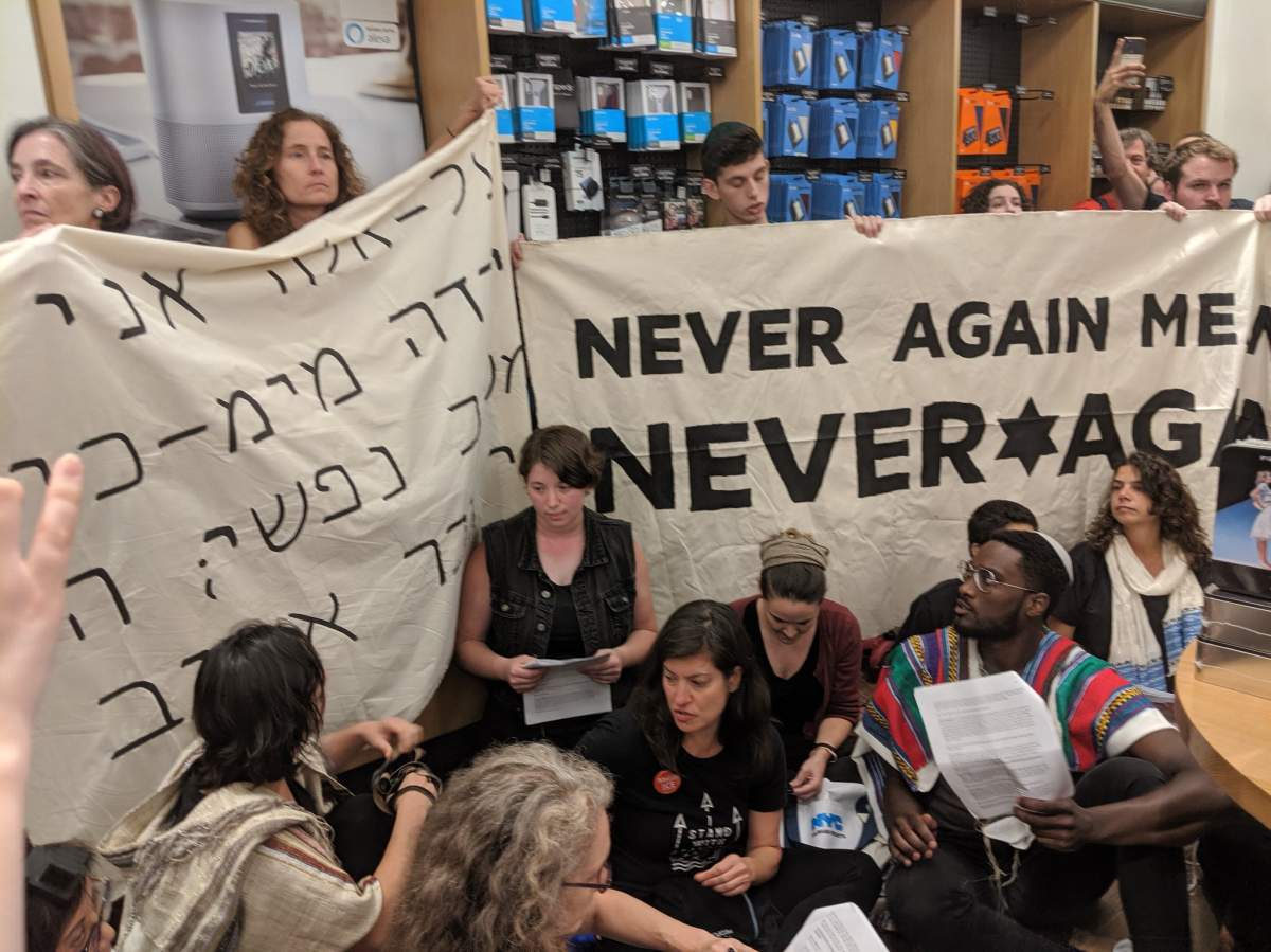 Jewish groups occupied an Amazon Books location in Manhattan to protest the tech giant doing business with ICE.