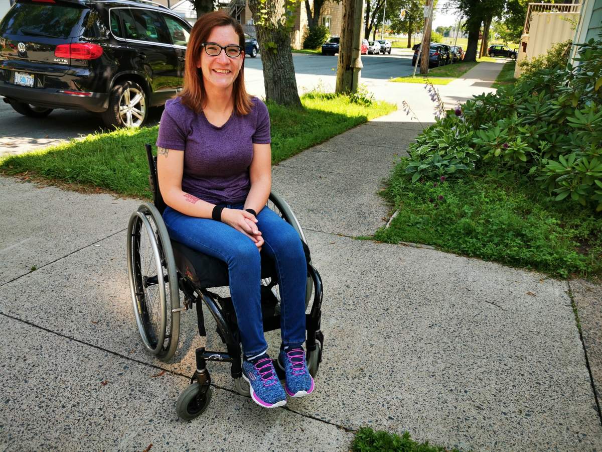 April Hubbard is a wheelchair user who says accessible parking spots are a matter of safety for those who need them.