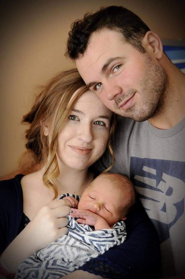 Blake Bivens is shown with his wife, Emily, and their young child in this image posted to Emily’s Facebook page July 16, 2018.