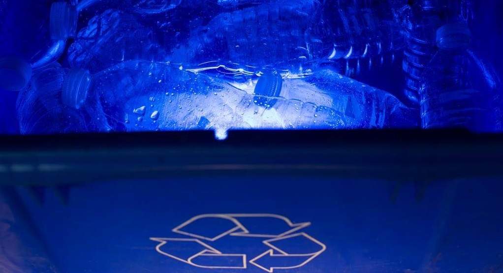 Plastic water bottles are pictured in a blue box recycle bin in North Vancouver, B.C., Tuesday, May 7, 2019.