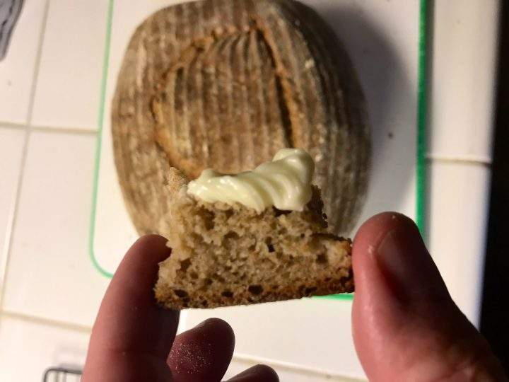 Seamus Blackley shows a piece of buttered sourdough made from ancient Egyptian yeast.